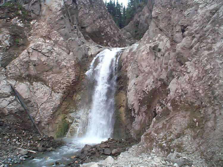 Photo of Zymoetz Copper River u-shaped valley and falls, in 2004: the aftermath of the June 8th avalanche 2002.